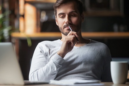 Young man concerned about finances